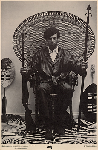 Portrait of Huey P. Newton on wicker chair. Creative Commons (CCO 1.0)