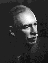 Keynes - conservative-looking Englishman with moustache and thinning hair
