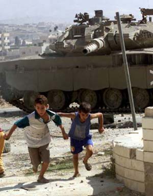 Israeli tank and Palestinian boys